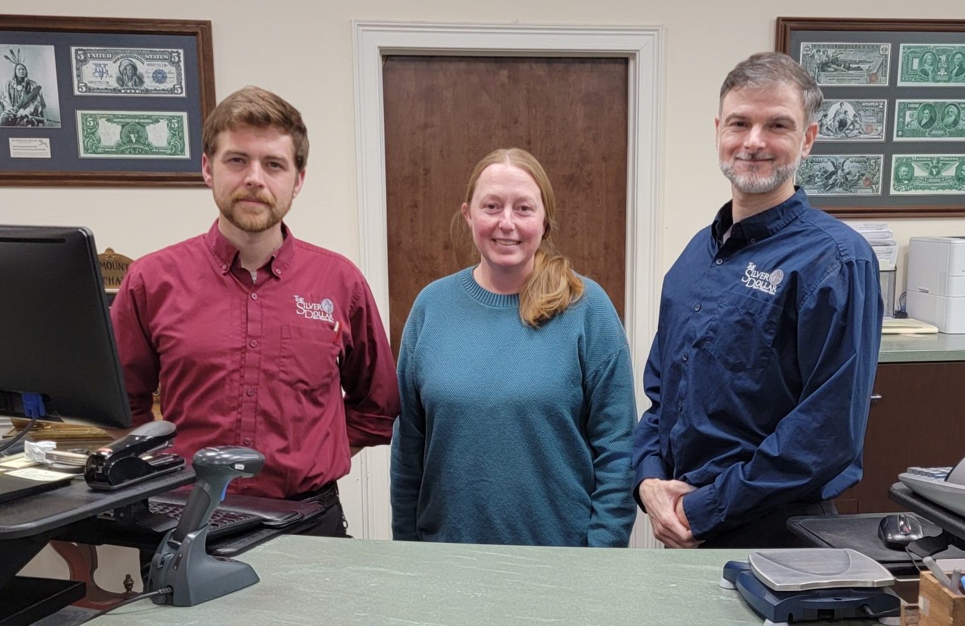 The Roswell Silver Dollar Team at the store